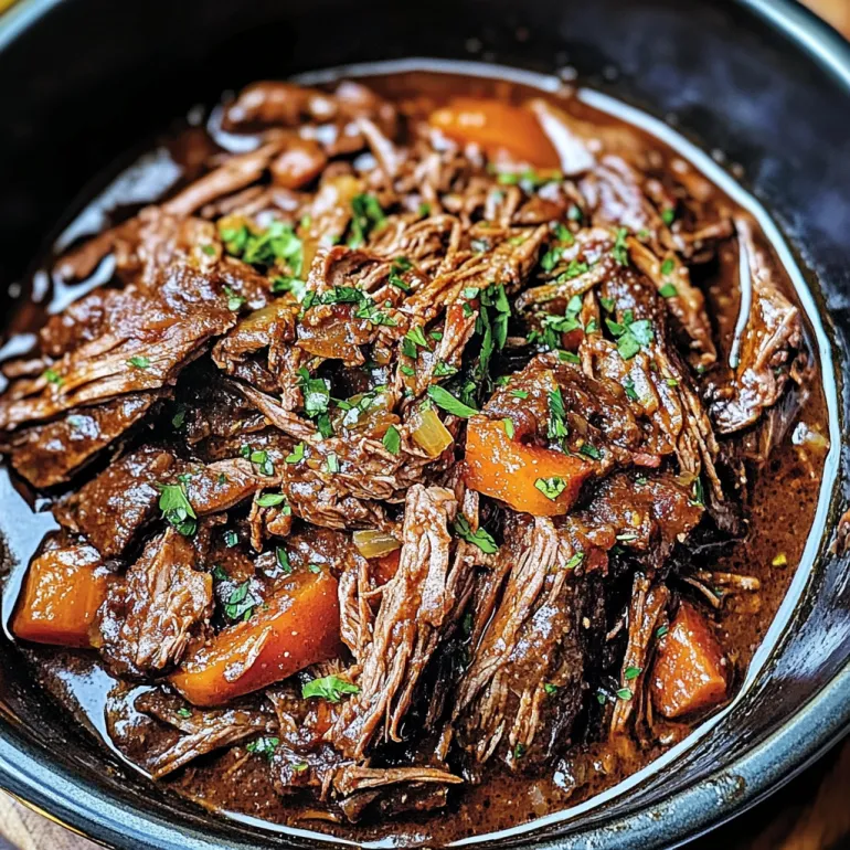 A bowl of slow cooker barbacoa beef.