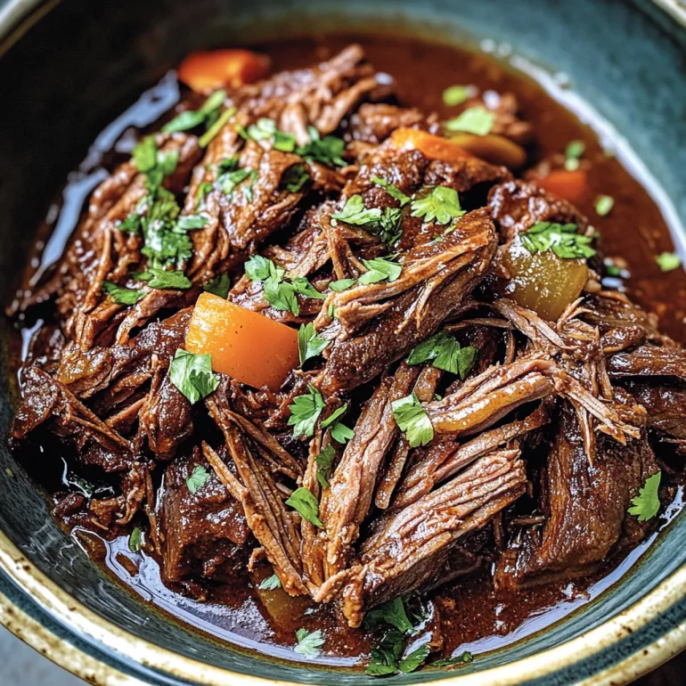 A bowl of slow cooker barbacoa beef.