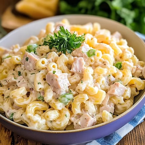 A bowl of tuna macaroni salad.